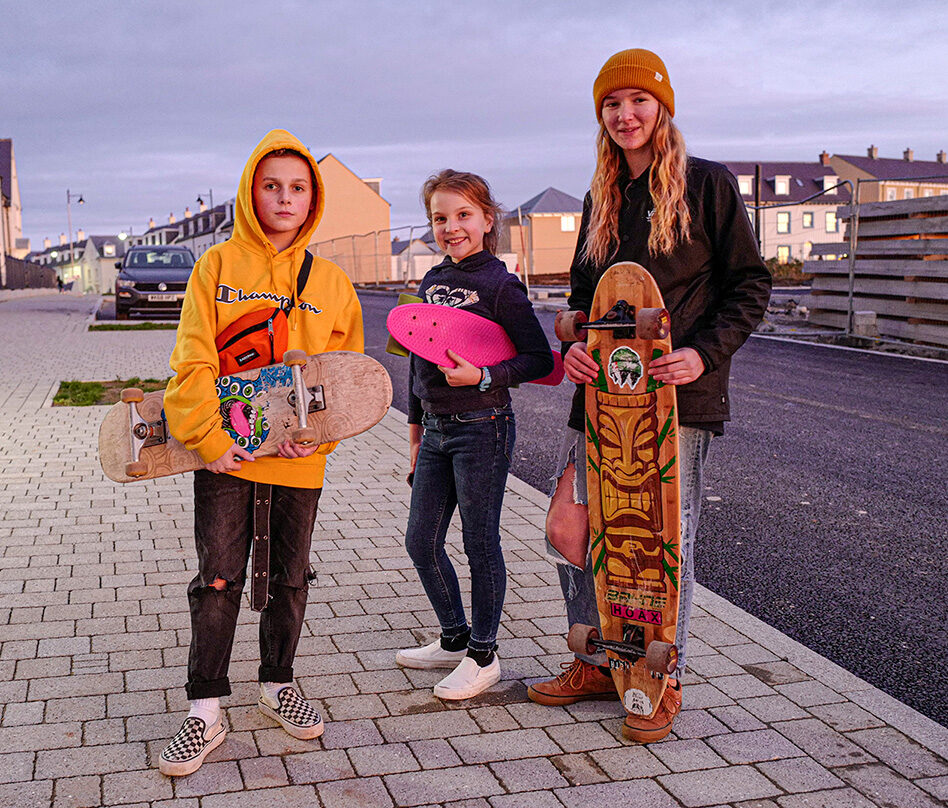 three children from Nanseldan with skateboards e1683543082170