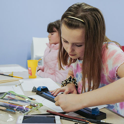 Young Girl Doing Crafts At School Preview Image